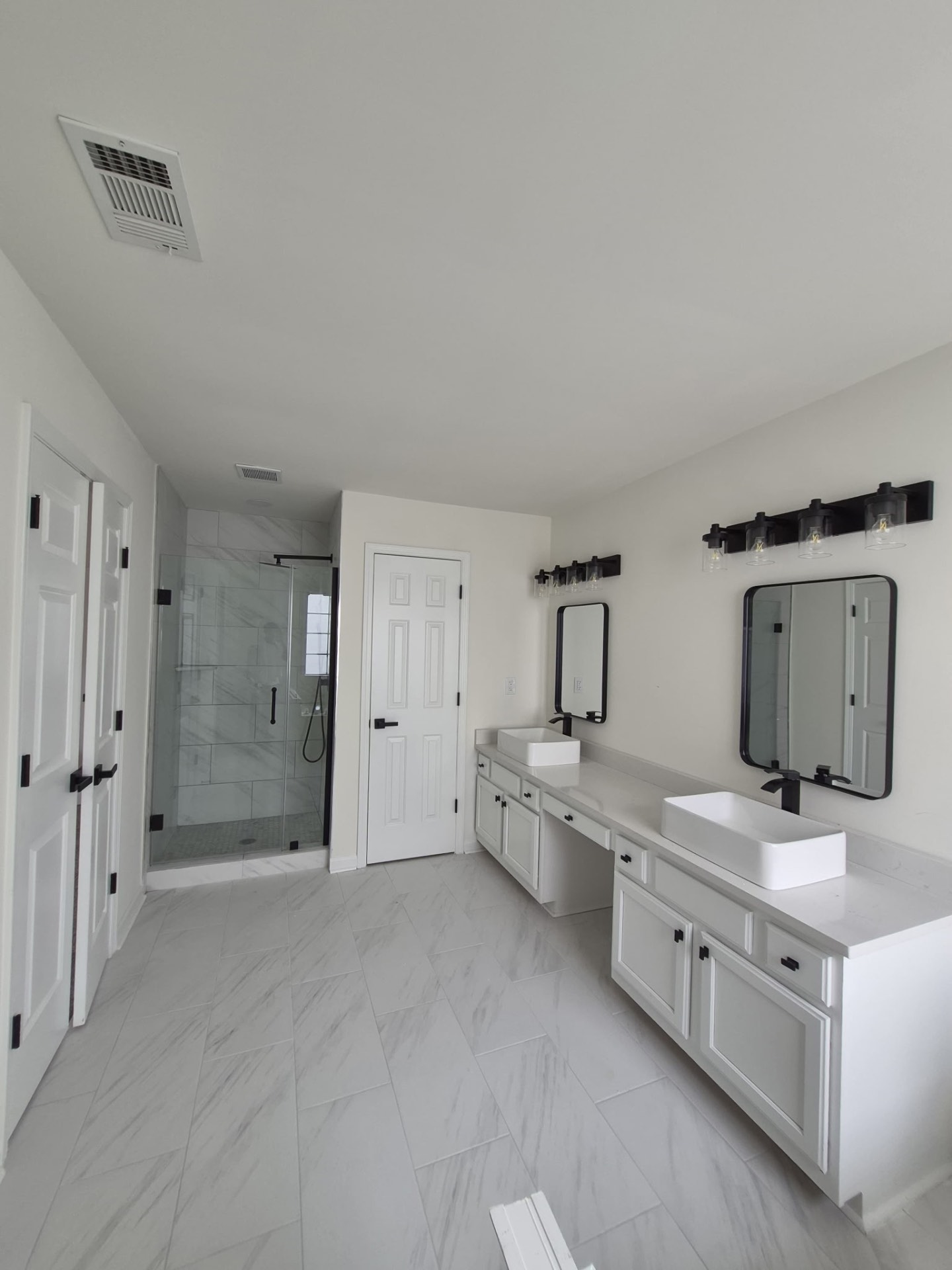 Full bathroom remodel with double vanity
